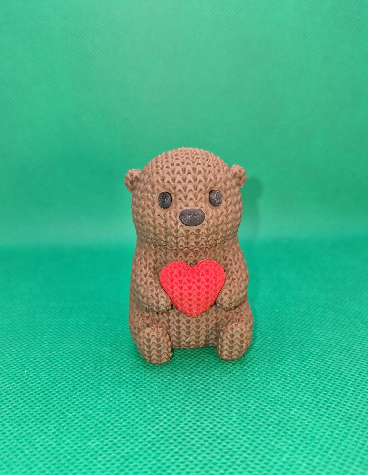 Otter Holding a Heart - product view 3